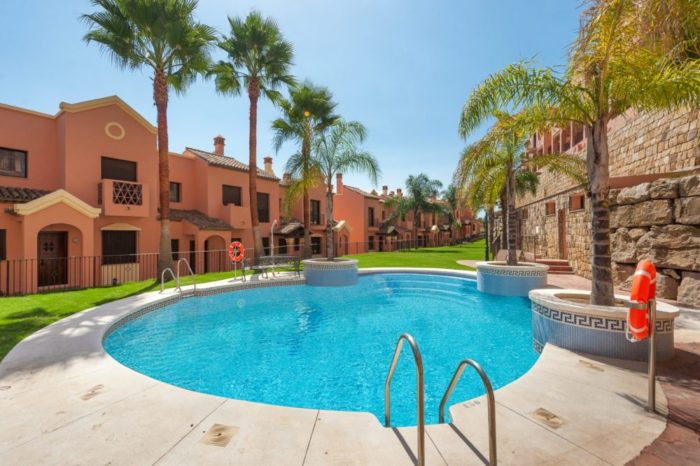 Pool area of townhouse property for sale in Estepona, Costa del Sol