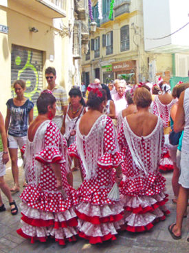 Women in Flamenco dresses at Malaga Feria